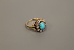 An antique turquoise and diamond cluster ring