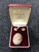 A 9ct gold backed cameo brooch and matching earrings