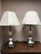 A pair of French ormolu mounted white marble table lamps with shades, height 90 cm (2).