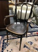 An early 20th century Bentwood armchair.