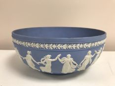 A Wedgwood Jasper Ware fruit bowl decorated with panels of dancing maidens, diameter 26 cm.