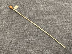 An early 20th century marine vertebrae swagger stick.