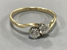 18ct two stone diamond twist ring (old cut) - approximately .