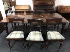 An early Victorian mahogany extending dining room table, width 117.