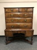 An eighteenth century walnut chest on stand, width 102 cm.