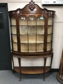 A good quality Georgian style mahogany display cabinet raised on pad feet with under-stretcher,