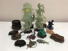 A tray of Chinese and Eastern carvings and collectables including jade carvings on stands,