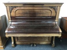 An early 20th century mahogany cased over strung piano by Hornung & Moller,