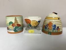 A Clarice Cliff Bizarre Crocus pattern honey pot, with lid,