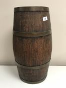 An early 20th century metal bound oak barrel.