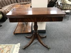 A Regency style mahogany d-shaped card table, width 85 cm.