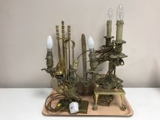 A 19th century two-branch candelabrum converted to a table light, together with a similar lamp,