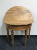An antique style pine d-shaped folding table,