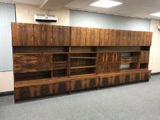 A mid 20th century rosewood modular triple section storage cabinet, width 459 cm, height 186 cm.