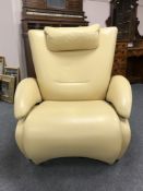A cream leather adjustable contemporary armchair by De Sede, height 100 cm.