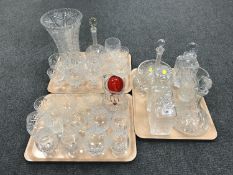 A good collection of 20th century crystal to include six decanters, deep-cut crystal vase,