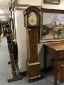 A good quality walnut cased granddaughter clock with Whittington & Westminster chimes,