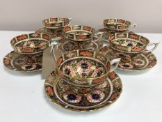 A set of six Royal Crown Derby tea cups and saucers, pattern 9021.