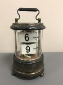 A silver cylindrical desk clock, height 15.5 cm, Ever Ready Co, (Alfred Lobel), London 1910.