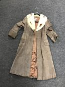 A mid twentieth century fur lined mocha suede lady's coat.
