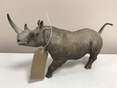 A Coalport figure - rhinoceros, matt glaze,