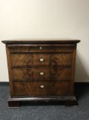 A 19th century mahogany four drawer chest on bracket feet,