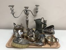 A tray of silver plated candelabrum, silver backed brushes, antique pewter tankard, metal items etc.