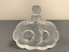 A Lalique perfume bottle Falcon Deux Fleurs, height 9.2 cm, signed Lalique France to base.
