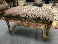 A Louis XV style double dressing table stool, width 93 cm.