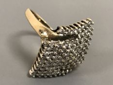 A diamond cluster ring, upon a yellow gold shank,