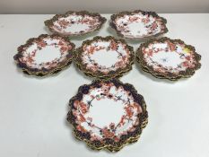 Fourteen Royal Crown Derby cabinet plates, pattern 4964.