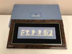 A Wedgwood Jasper Ware framed panel depicting cherubs, 34 cm x 19 cm,