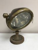 An early twentieth century brass speedboat lamp by C A Vandervell and Co, London, height 40 cm.