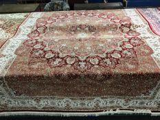 A very fine, modern Isfahan design carpet on red ground, 330 cm x 240 cm.
