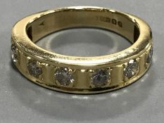 18ct half eternity ring with eight stones 5.
