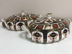 A pair of Royal Crown Derby lidded tureens, Imari pattern 1128, width 32 cm.