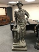 A large bronze statue - The Blacksmith with hammer, height 200 cm.