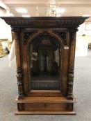 A Victorian Polyphon, in walnut case, together with fifty discs and winding handle.