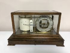 An early twentieth century oak barograph, with ivorine label Thomson, Skinner & Hamilton, Glasgow,