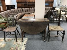 A George III oak gate leg table on pad feet, width 100 cm,