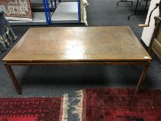 A mid twentieth century rosewood copper topped map table, 79.5 cm x 140 cm.