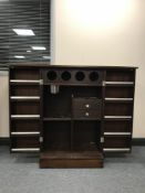 A mid 20th century rosewood concertina folding portable bar, fully extended width 133 cm,