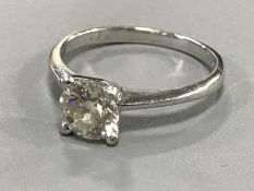 A platinum diamond solitaire ring, approximately 0.72ct, size H.