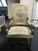 An 18th century style gilded tapestry seated open armchair,