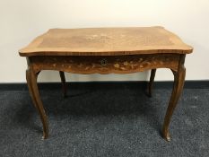 A Dutch marquetry style inlaid walnut low table, fitted with a drawer, with shaped top,