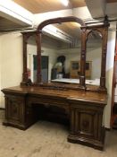 An impressive late Victorian mahogany inverted breakfront mirror backed sideboard, width 256 cm.