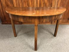 A George III mahogany d-shaped console table, width 111.5 cm.