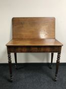 A 19th century mahogany turn over top tea table, width 90.