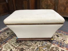 A 19th century sarcophagus form storage box of bun feet, dimension 79 cm x 51 cm.