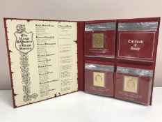 Kings & Queens of Great Britain, an album of 23ct gold layered stamps,